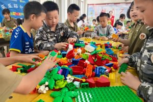 【品牌项目进展】第五小学开展“积木筑梦·巧手绘端午”乐乐箱拼搭活动